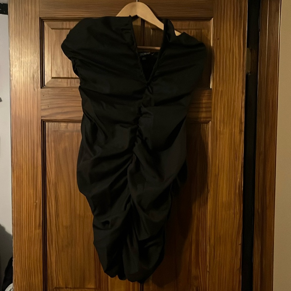 Black dress with very low cut v